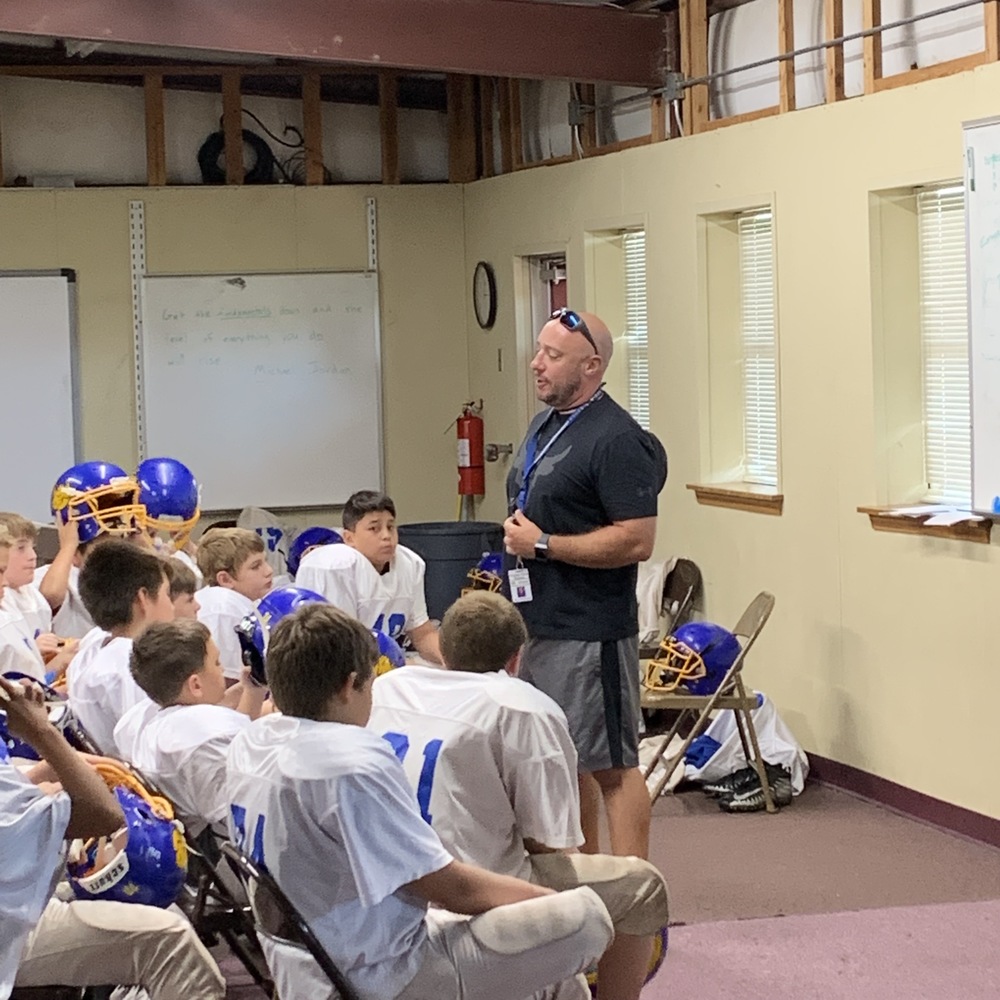 Coach Mac talking to the team.