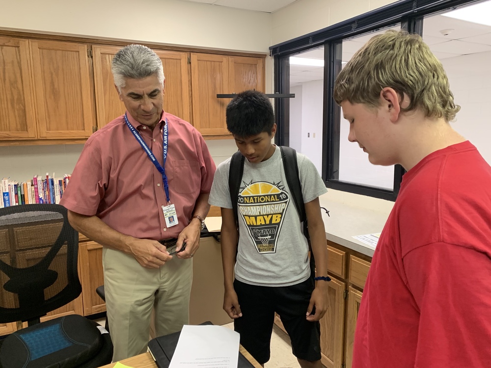 Dr. Ben visiting with students.